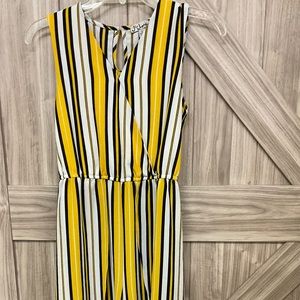 J for Jusyify jumpsuit……slit legs…